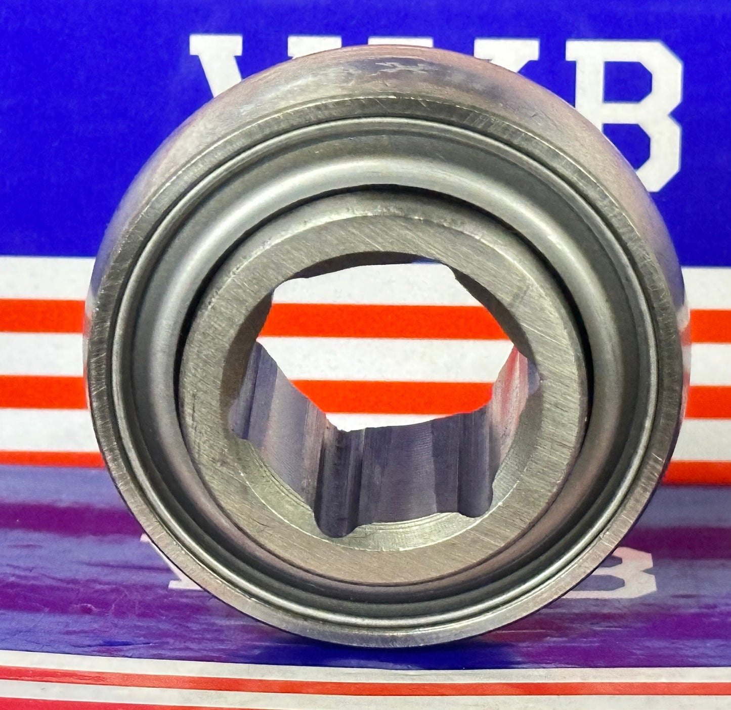 205KRRB2 Agricultural Machinery bearing with Two Single lip Seals and Hex bore and Spherical OD